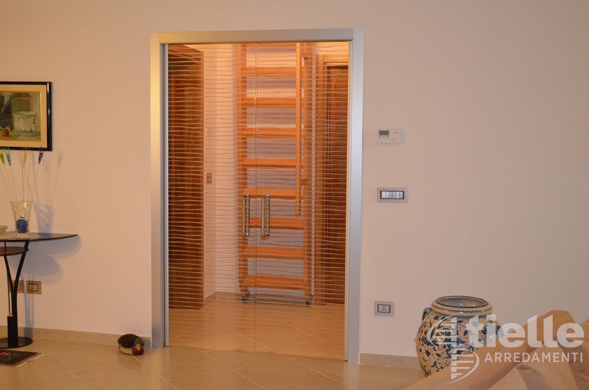 Porta a 2 ante comppletamente in vetro Porte